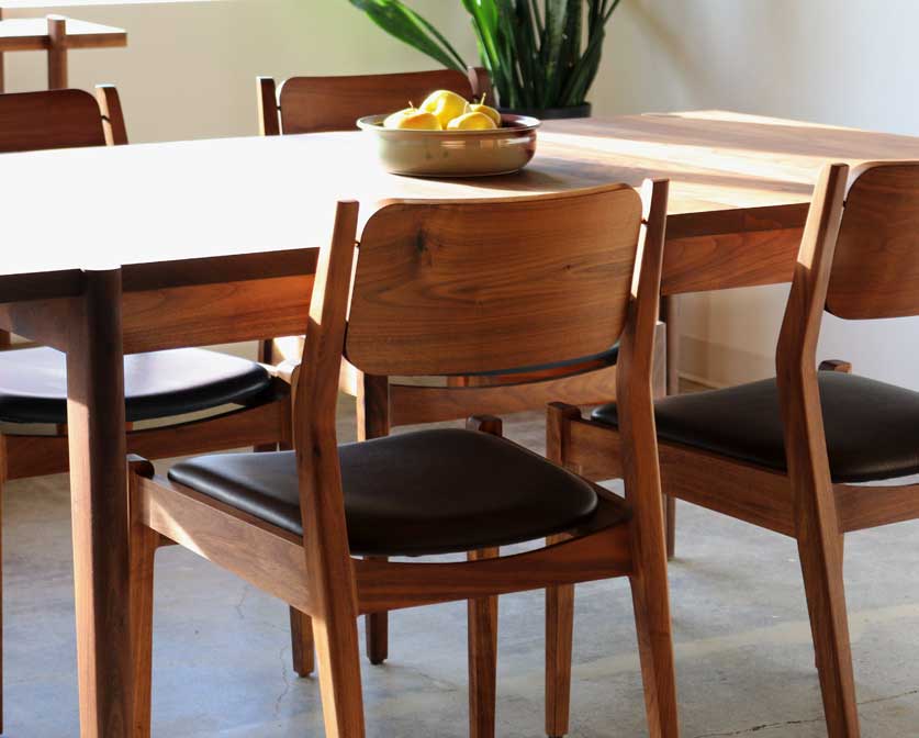 Sebastian Dining Table detail with Whitman Dining Chairs