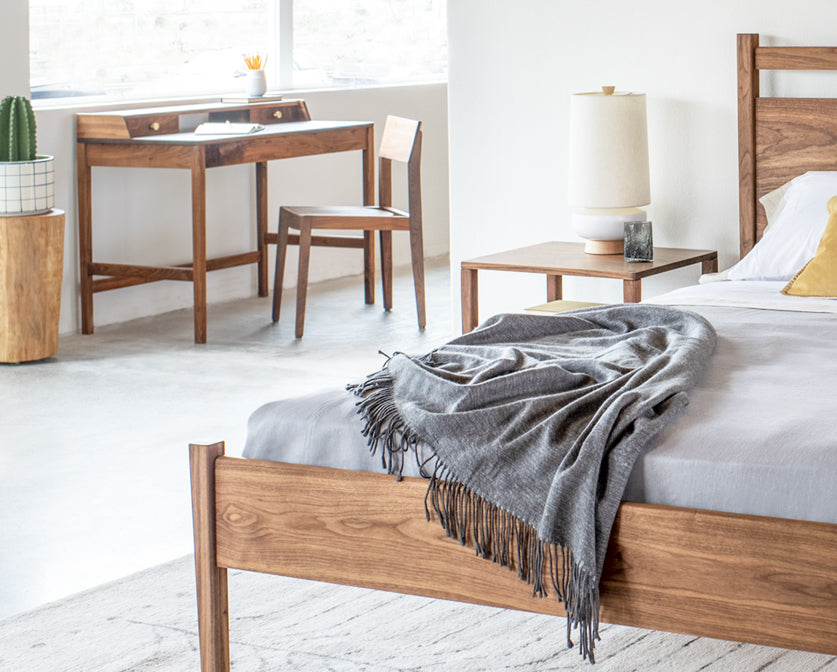 Klamath chair in Eastern Walnut with the Maud desk and Maud bedroom set