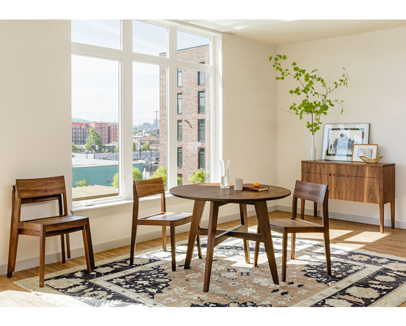 Klamath Dining Chair in Eastern Walnut with Klamath dining table and sideboard.