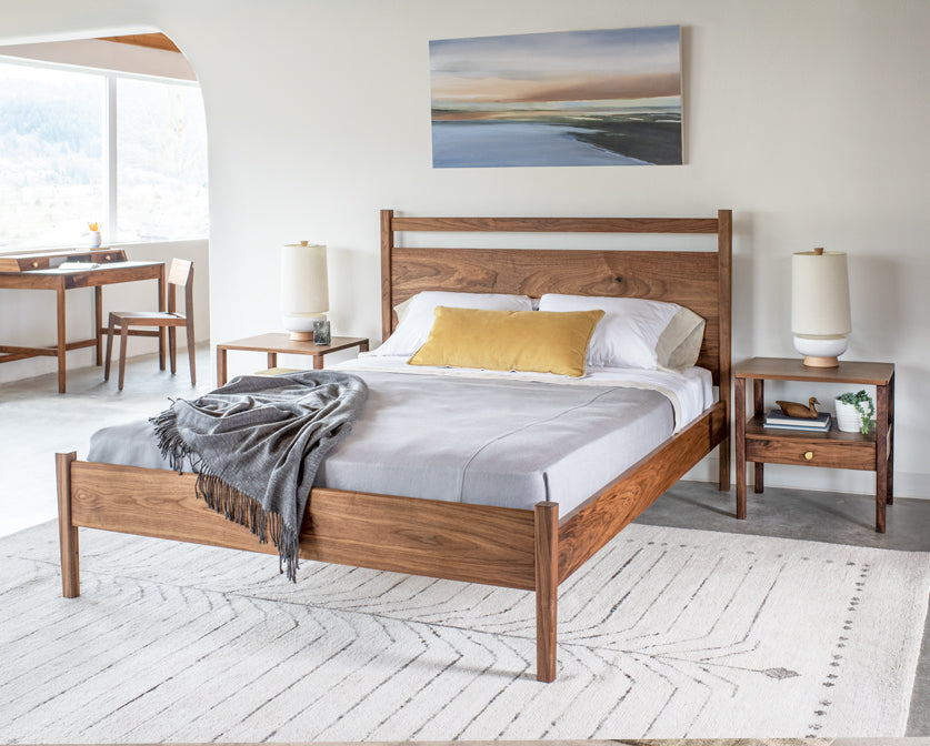 Maud bedroom vignette with Maud nightstands, bed, desk and Klamath Chair in Eastern Walnut