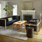 Celilo Coffee Table in Cherry with Celilo Sofa and Lounge Chairs.