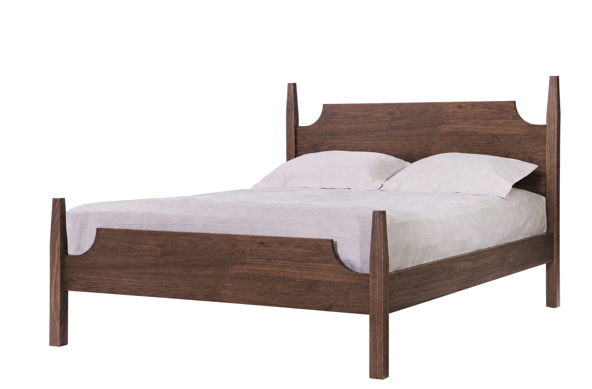 A dark brown wooden bed frame with a curved headboard and footboard, shown with white bedding and two pillows against a solid white background.