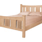 A traditional bed with slats and panels made with light Maple wood frame and headboard, dressed in white bedding and two white pillows, shown against a plain white background.