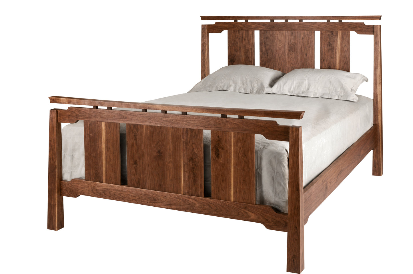 A wooden bed frame with a slatted headboard and footboard, shown with white bedding and pillows on a plain white background.