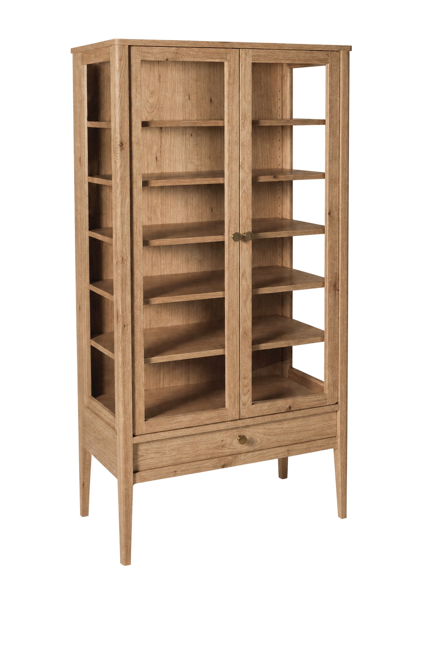 A tall, light oak wood display cabinet with two glass doors, multiple interior shelves, and a single drawer at the bottom, shown on a plain white background.