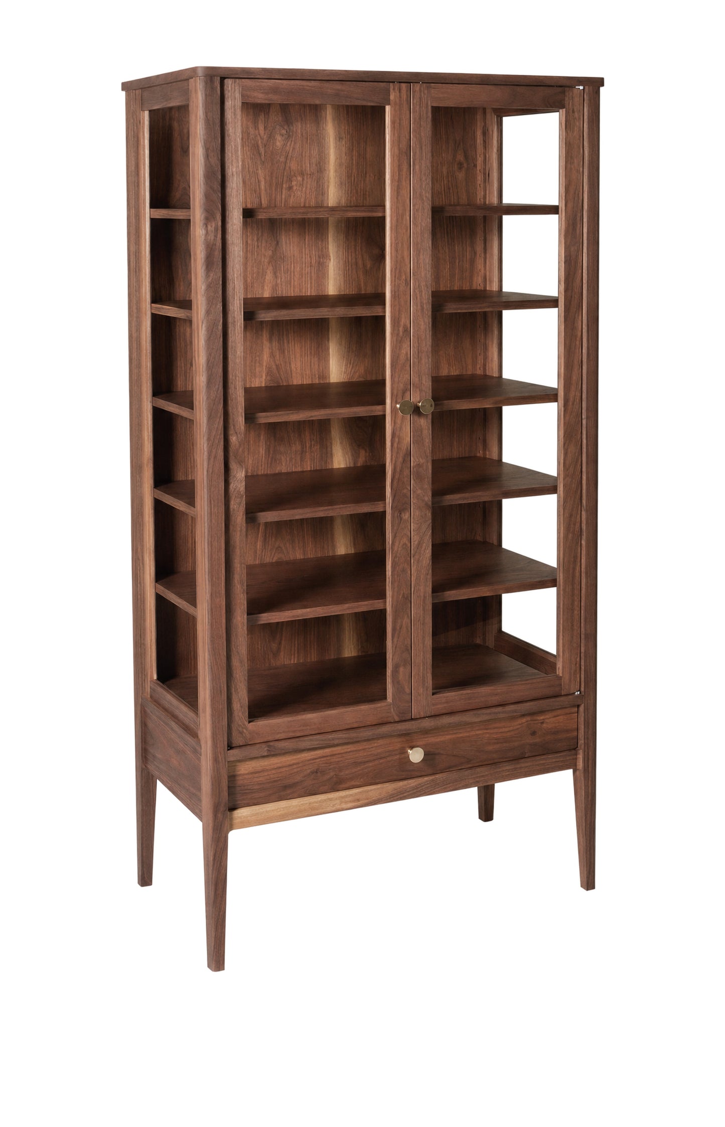 A tall wooden display cabinet with glass doors, multiple interior shelves, and a lower drawer, shown on a plain white background.