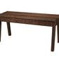 A dark brown wooden bench with a slatted seat and four legs, shown from a three-quarter angle on a solid white background.