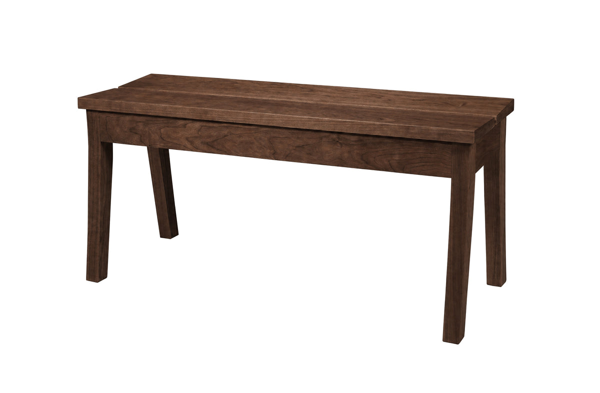 A dark brown wooden bench with a slatted seat and four legs, shown from a three-quarter angle on a solid white background.