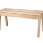 A light natural wood bench with a rectangular top and four legs, shown from a three-quarter angle on a solid white background.