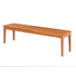 A long rectangular wooden bench with four legs, shown from a three-quarters angle on a plain white background.