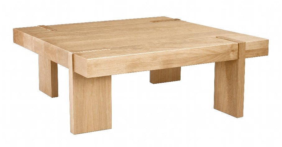 A square wooden table with thick blocky legs and visible wood grain, shown on a plain white background.