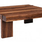 A rustic rectangular wooden coffee table with thick slatted top and blocky legs, shown on a plain white background.