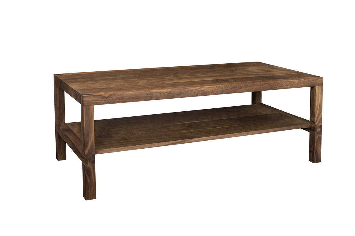 A rectangular wooden coffee table with a dark brown walnut finish, featuring a top surface and a lower shelf, isolated on a white background.