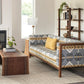 Sebastian Tall Bookcase in Eastern Walnut with Celilo Sofa and Live-Edge miter wrap coffee table