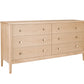 A mid-century modern six-drawer wooden dresser in a light Maple finish, featuring small round brass knobs, shown on a solid white background.