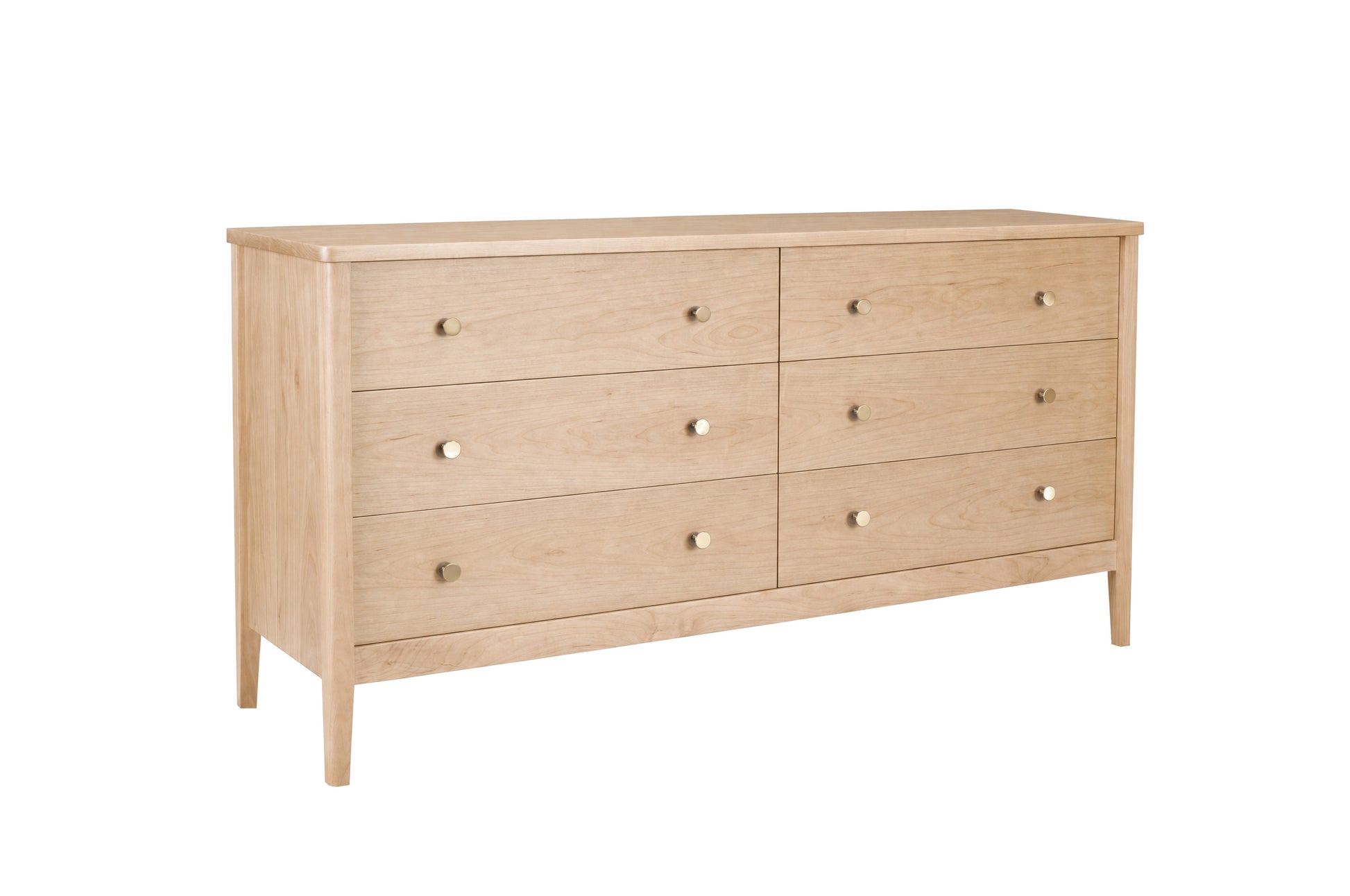 A mid-century modern six-drawer wooden dresser in a light Maple finish, featuring small round brass knobs, shown on a solid white background.