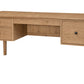 A light oak wood writing desk with two drawers on the left, one center drawer, and one larger drawer on the right, featuring small black metal pulls, shown on a solid white background.