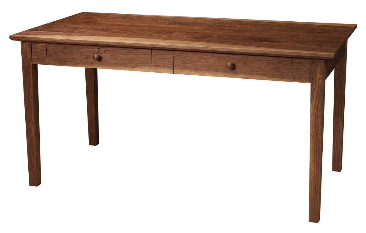 A medium brown wooden writing desk with two drawers and round knobs, shown on a plain white background.