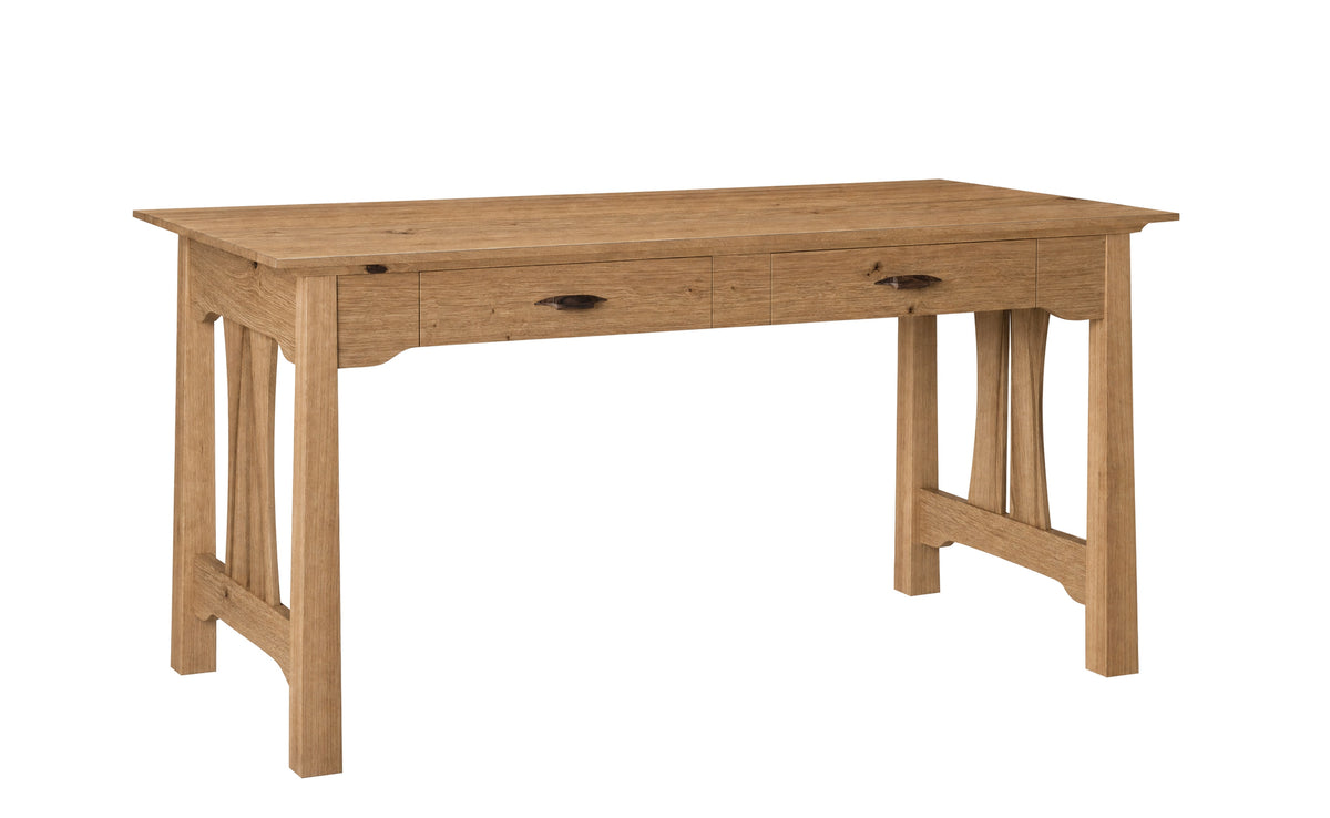 A wooden writing desk with a light Oak finish, featuring a single drawer with dark wood handles and decorative apron legs, shown on a solid white background.