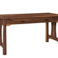 A wooden writing desk with a dark Walnut finish, featuring a single drawer with dark wood handles and decorative apron legs, shown on a solid white background.