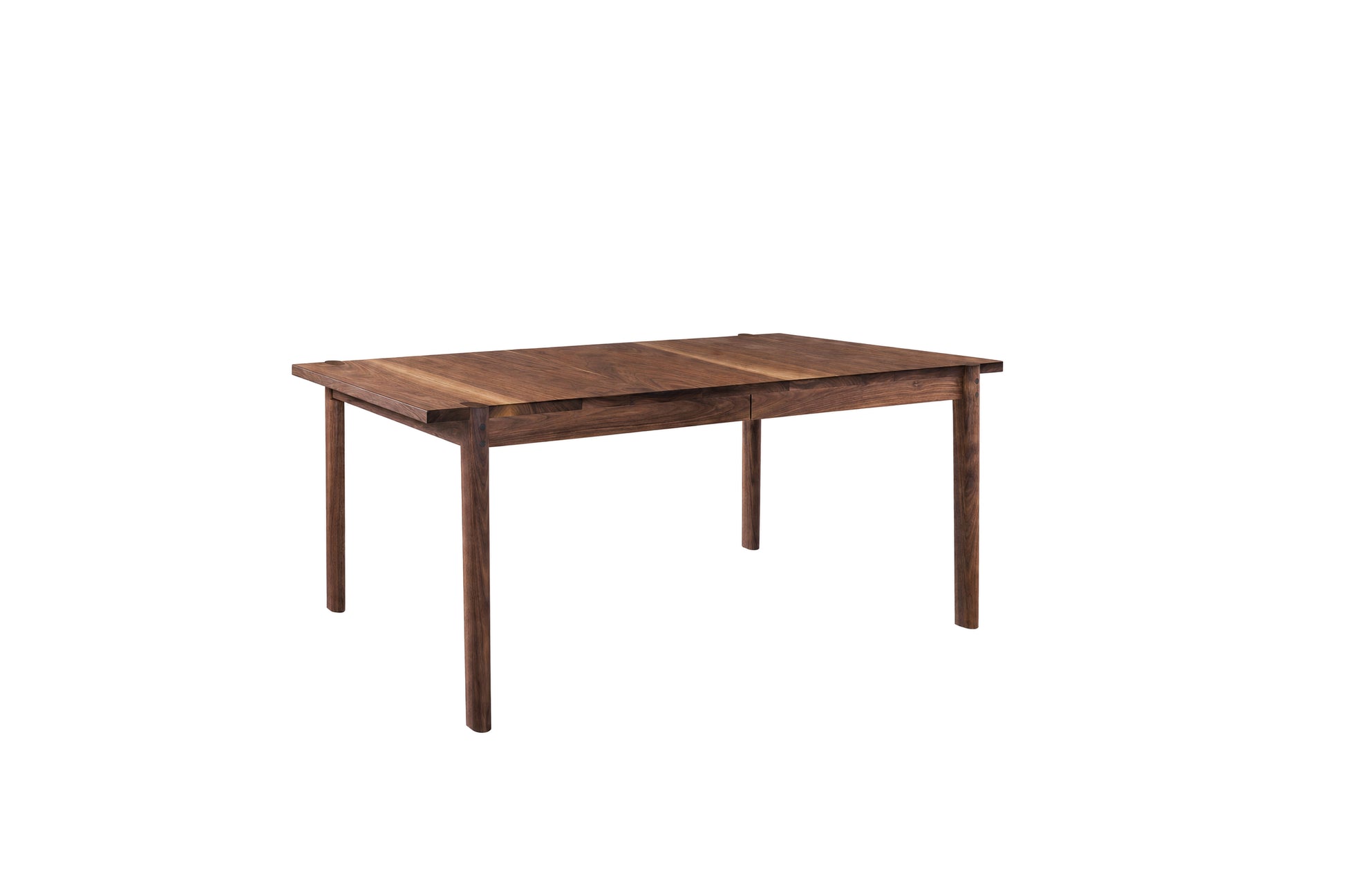 A dark brown wooden dining table with a rectangular shape and four legs, shown from a three-quarters angle on a solid white background.