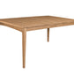 A rectangular wooden dining table with a natural oak finish, featuring four tapered legs and a center seam on the tabletop, shown against a plain white background.