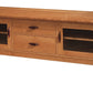 A wooden media console cabinet with a warm honey oak finish, featuring two central drawers with wood pulls and two side cabinets with glass doors, shown on a plain white background.