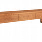 A Cherry modern wooden console table with three drawers and a minimalist frame, shown on a plain white background.