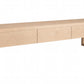 A modern light Maple wood console table with three drawers and open legs, shown on a plain white background.