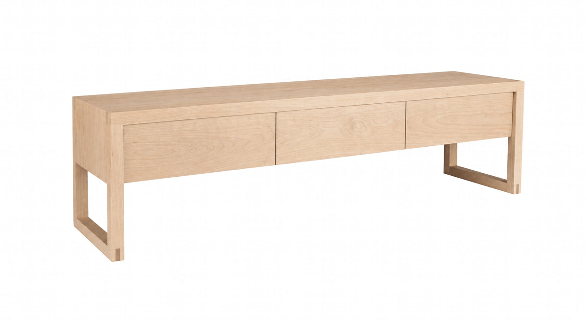 A modern light Maple wood console table with three drawers and open legs, shown on a plain white background.