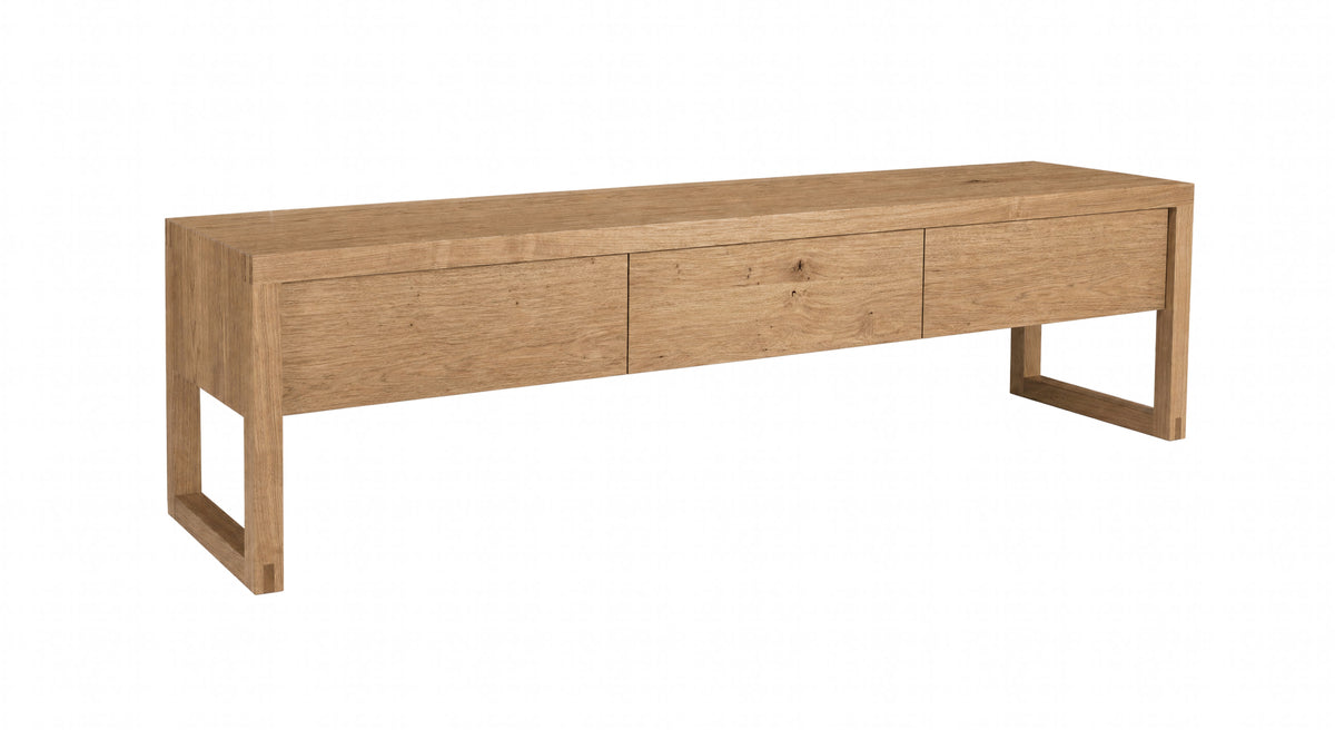 A modern long console with three drawers, featuring a natural oak finish and open square legs, shown on a plain white background.