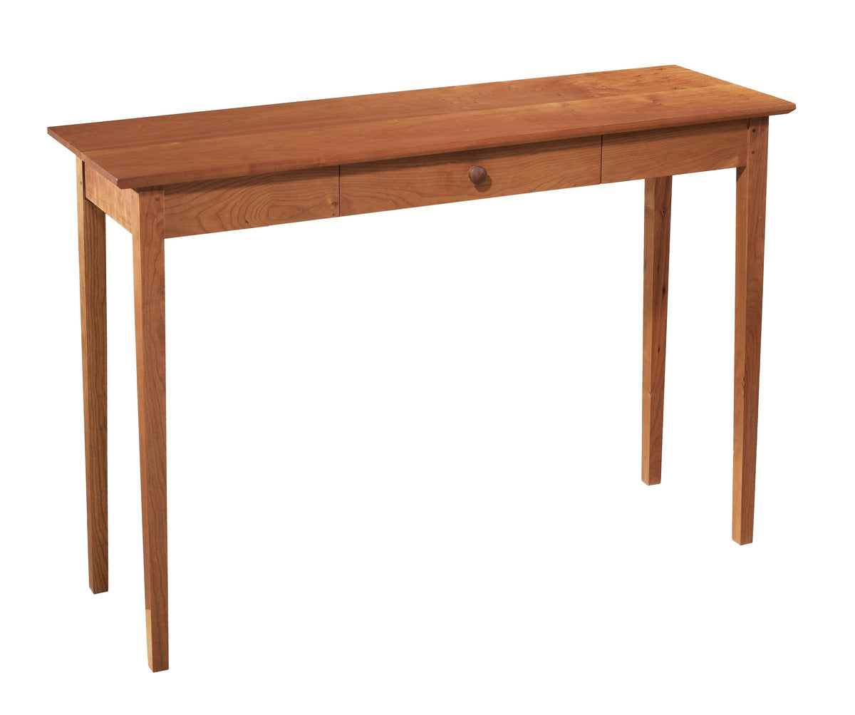 A mid-century modern wooden console table with a warm medium-brown finish, featuring a single drawer with a small round wooden pull, set against a plain white background.