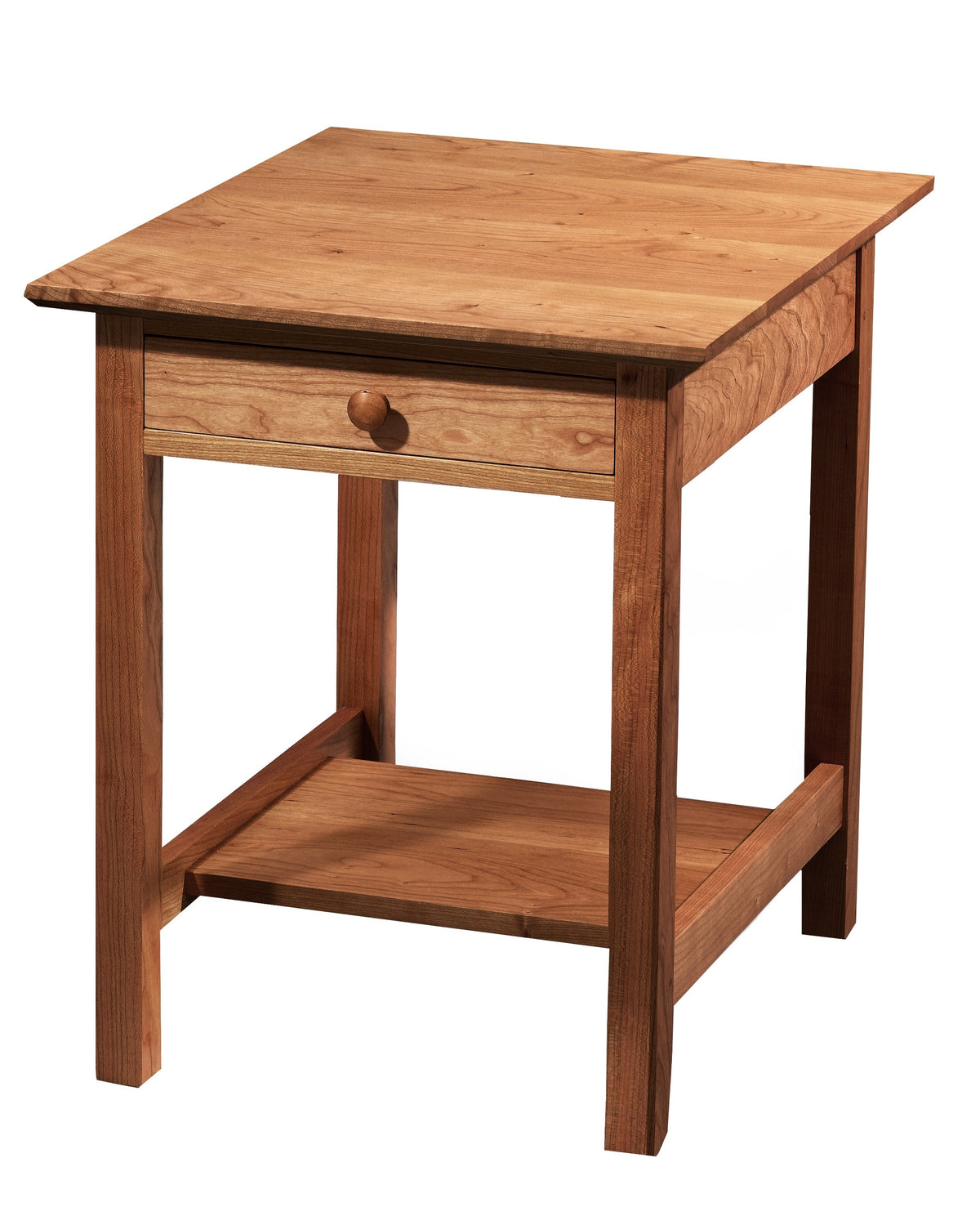 A warm Cherry wooden end table with a single drawer, round wooden knob, and an open lower shelf, shown on a plain white background.