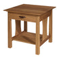 A square wooden end table with a single drawer, featuring a warm medium-brown finish and a dark metal pull handle, shown on a plain white background.