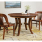 Banjo Chair and Jost Dining Table in Western Walnut