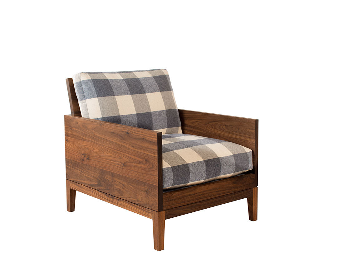 Clyde lounge chair in Eastern Walnut with special order fabric.