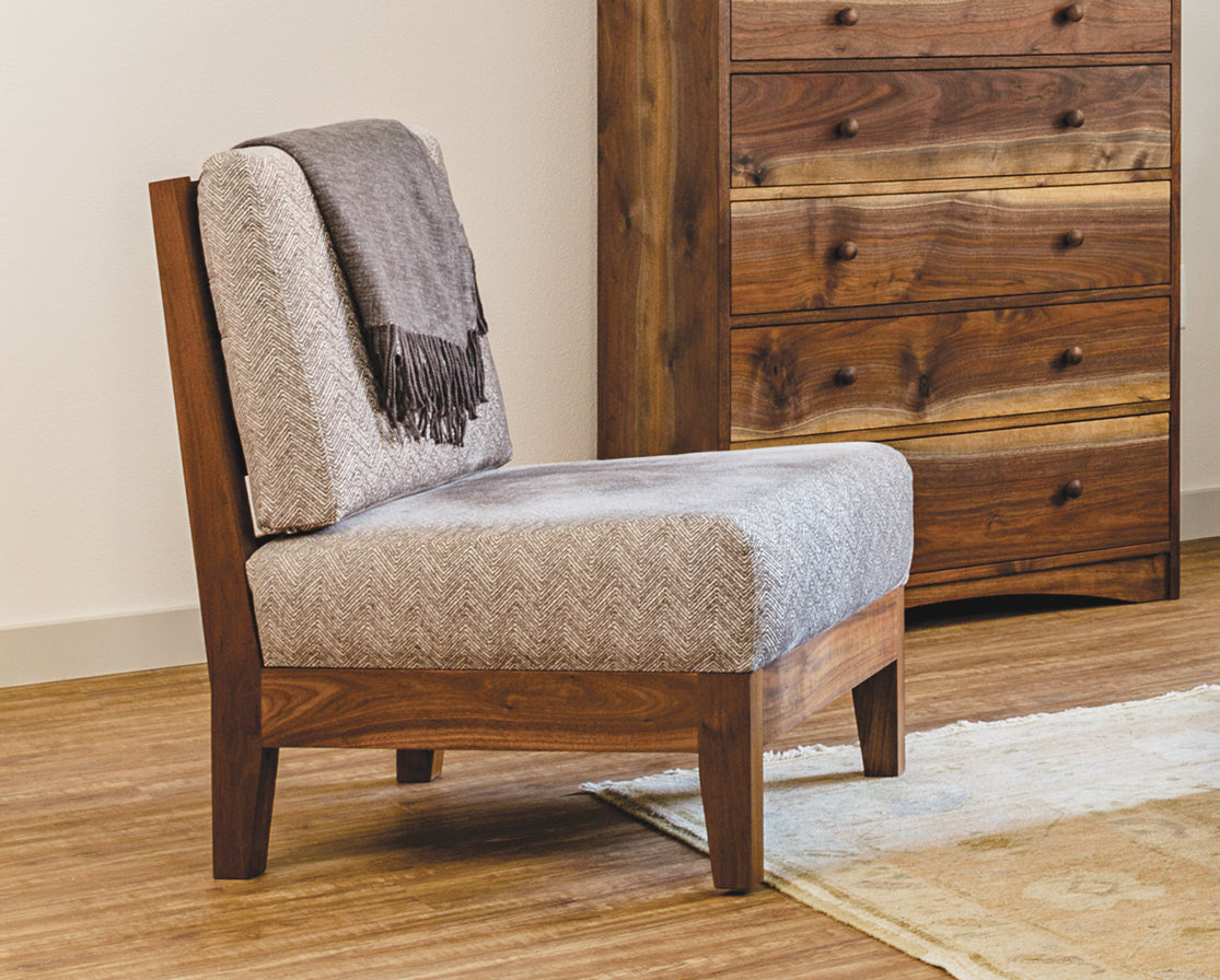 Slipper Lounge chair in Eastern Walnut with COM fabric. 
