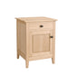 A light natural wood nightstand with a single drawer and a cabinet door, featuring dark metal knobs, shown on a plain white background.