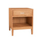 A mid-century modern wooden nightstand with a single drawer, open lower shelf, and tapered legs, finished in a warm medium brown wood tone with a small gold metal handle.
