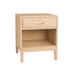 A light natural oak nightstand with a single drawer featuring a gold metal pull handle and an open lower shelf, shown on a solid white background.