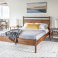 Maud bedroom vignette with Maud nightstands, bed, desk and Klamath Chair in Eastern Walnut