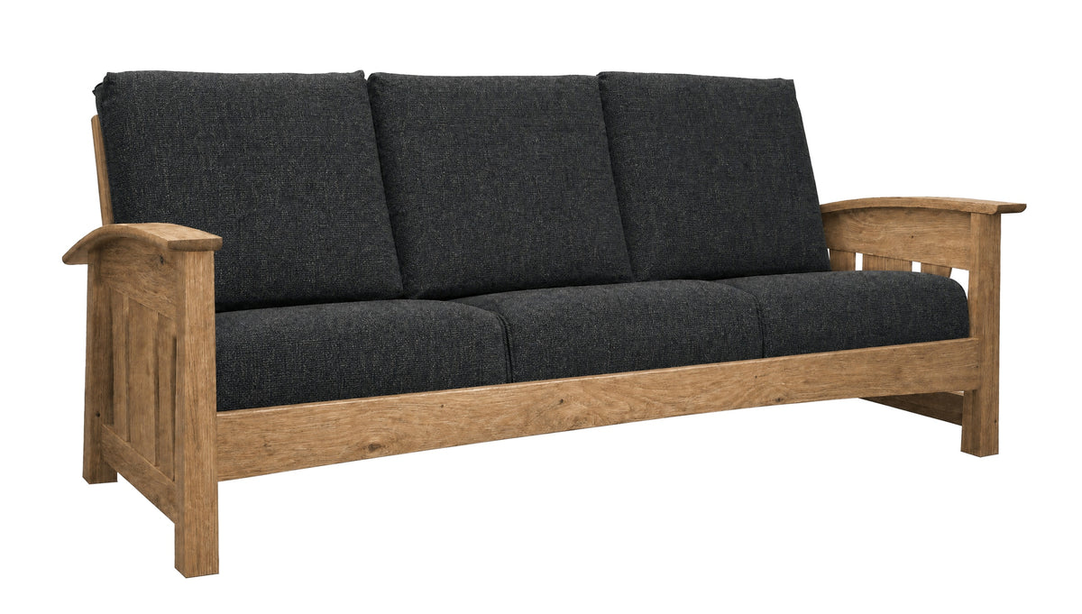 A wooden outdoor loveseat with dark charcoal gray textured cushions, featuring a natural oak frame and armrests, shown on a solid white background.