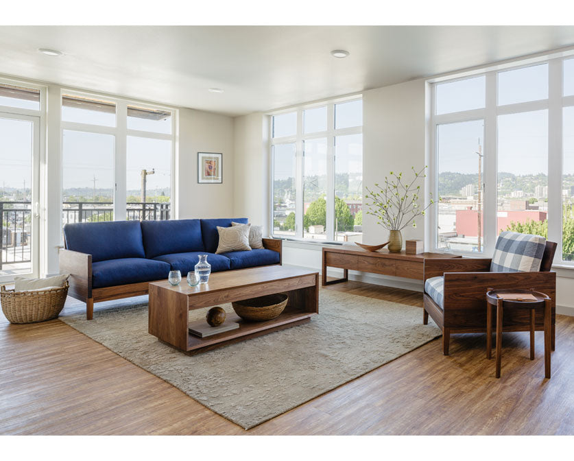 Modern Coffee Table in Eastern Walnut with Clyde seating. 