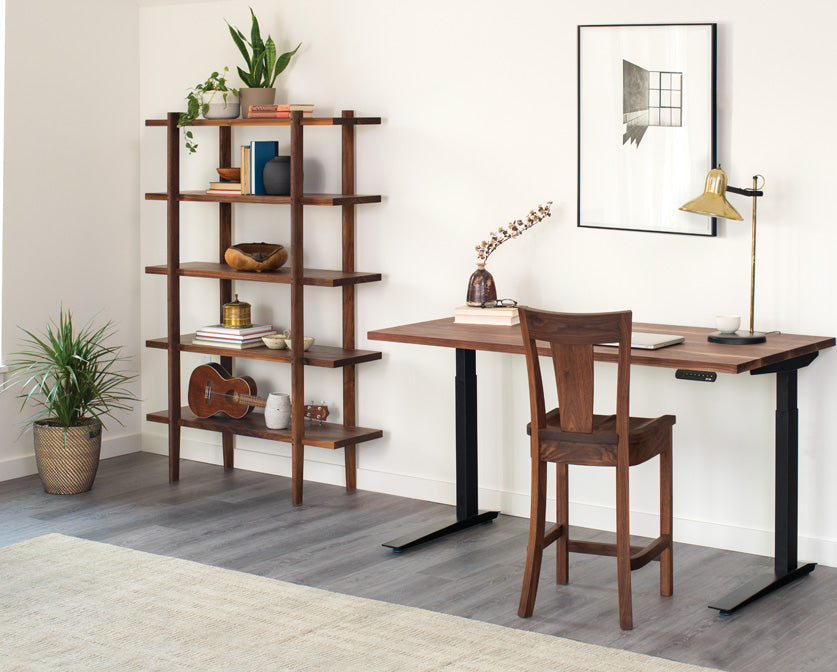 Jarvis standing desk in Eastern Walnut with Sebastian Bookcase and V-back stool