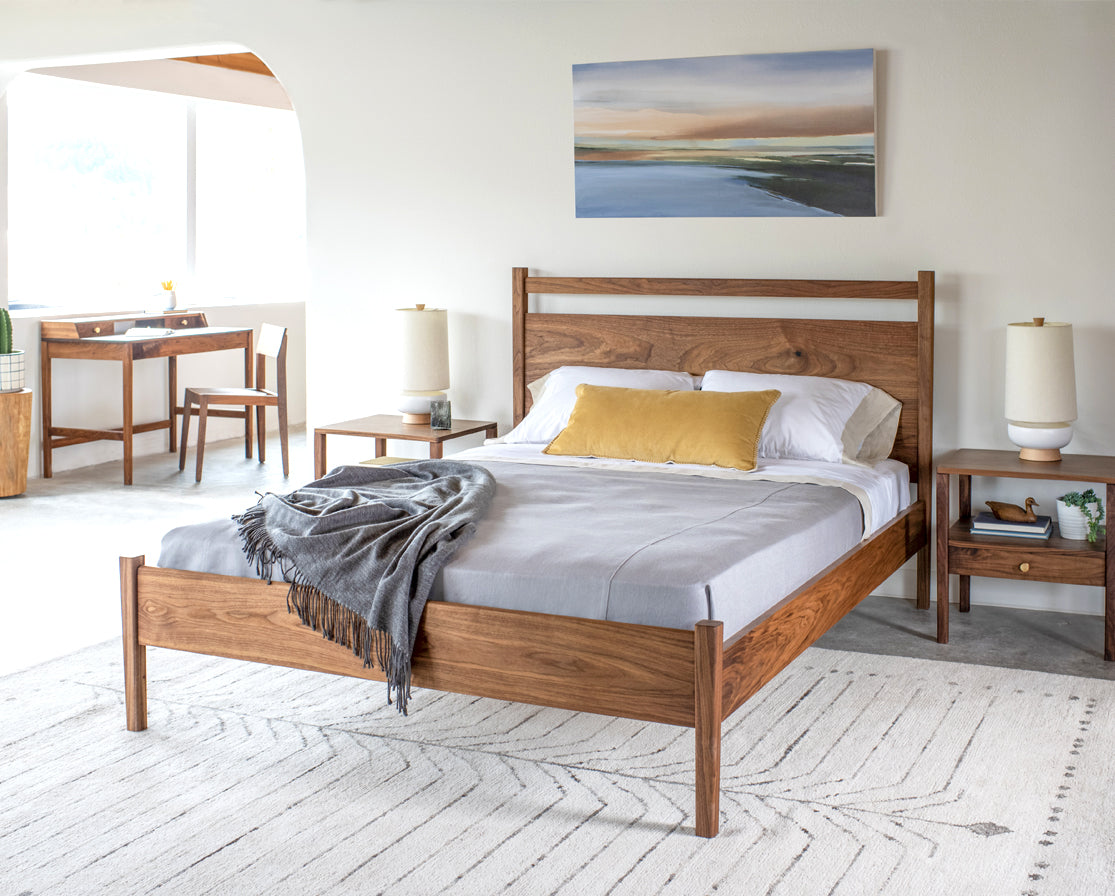 Maud bed in Eastern Walnut with Maud nightstands, Maud desk and Klamath chair.